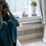 depressed woman having headache and stress
